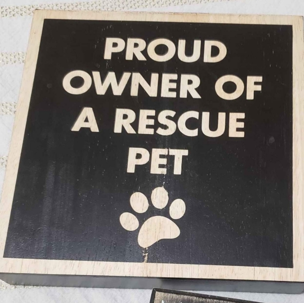 One (1) "Proud owner of rescue pet" sign